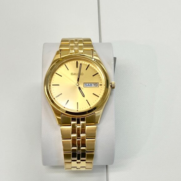 Seiko Gold Tone Stainless Steel Watch With Day And Date Calendar SUR434